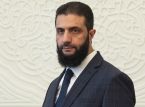Syriens midlertidige leder opfordrer til enhed midt i den eskalerende vold